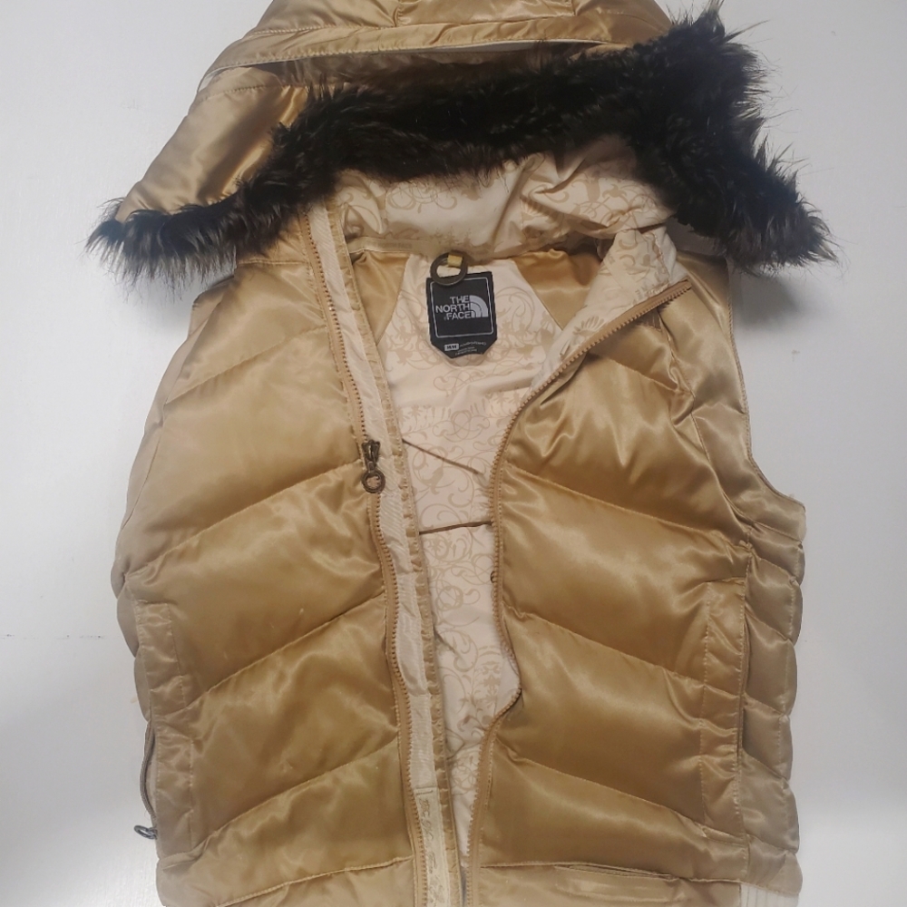North Face puffy vest with detachable faux fur hood lining
